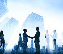 Silhouette of Law professionals shaking hands
